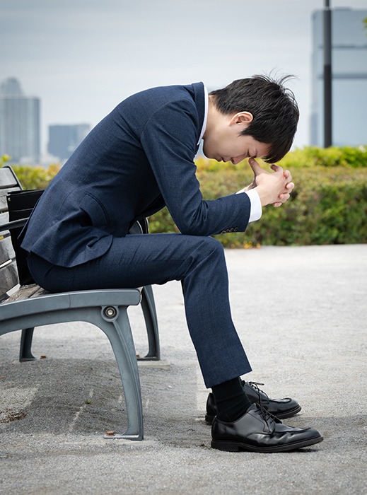 落ち込むサラリーマン